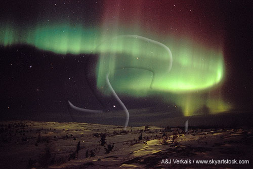 A ribbon-like curtain of swirling northern lights (Aurora Borealis)