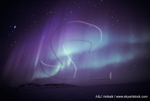 Curtains of purple and green northern lights (Aurora Borealis)