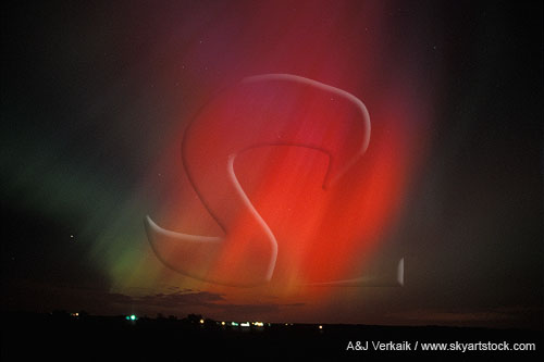 Bonfire of the gods: red northern lights (Aurora Borealis) 