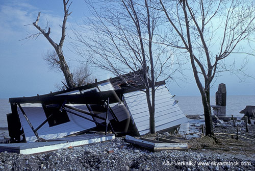 Wind damage to a cottage on the shoreline