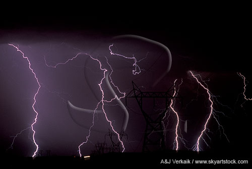 Lightning bolts strike along a power corridor