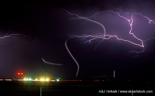A cloud-to-air lightning flash in an inky sky