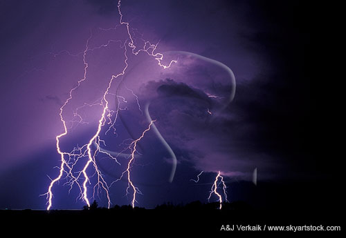 A haunting view of lightning bolts, low clouds and a rain curtain