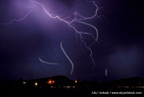 A finely detailed lightning tentacle reaches down over a city