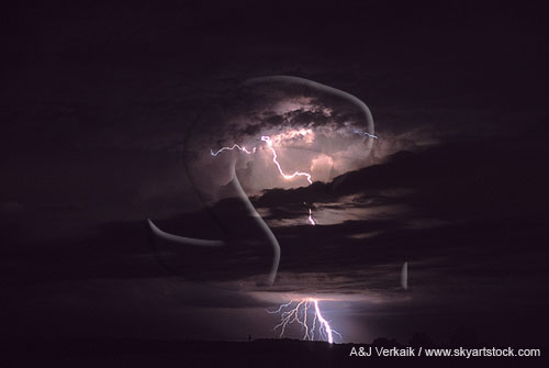 A dramatic cloud-to-ground lightning bolt strikes through layered clouds