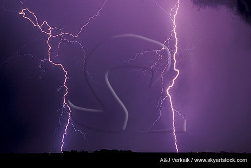 Two finely detailed close cloud-to-ground lightning bolts