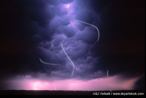 Intracloud lightning flashes glow through churning Mammatus