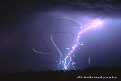 A single colorful power lightning bolt strikes