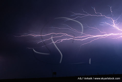 A spangled burst of spider lightning with multi-colored filaments