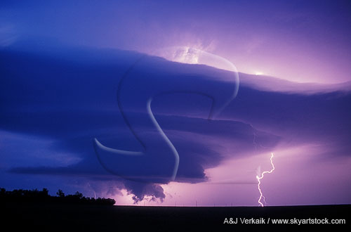 Mesocyclone and wall cloud with lightning at night