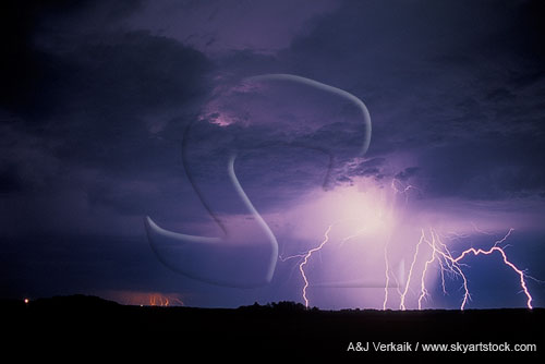 Cloud-to-ground lightning strikes in a turbulent sky