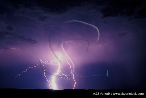 Mystery: a forked highly electric lightning bolt fogged by rain