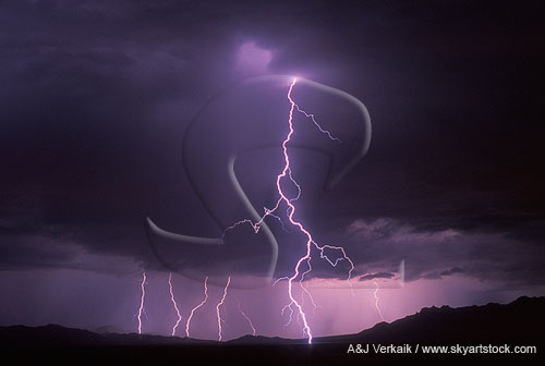 A twisted cloud-to-ground lightning strike in the mountains