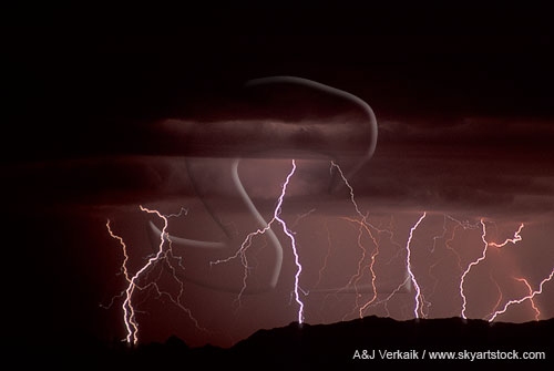 Gold and silver lightning with filagree filaments in the mountains