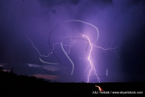 Lightning combines with filaments to illuminate a dusky sky