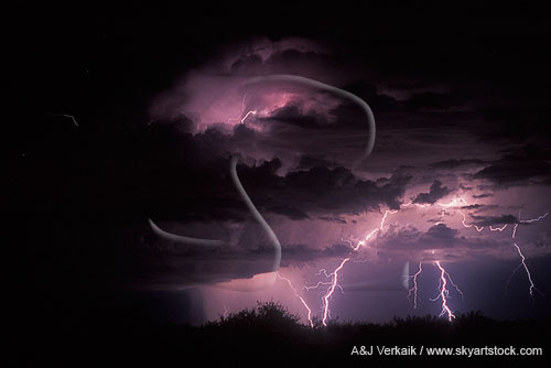 Several lightning bolts light a haunting storm cloud