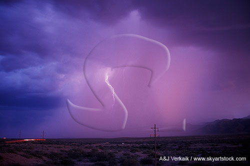 A delicate spear of lightning disappears into gushing pink rain 