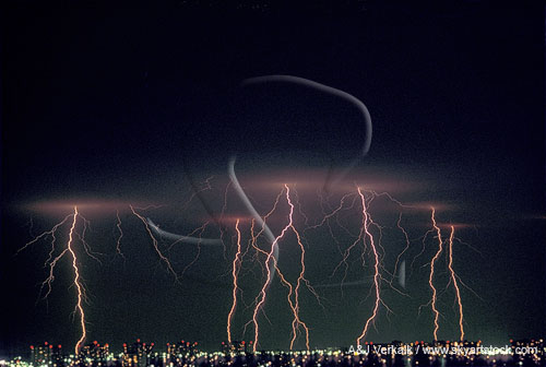 Lightning strikes over city