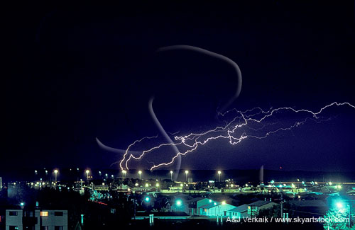A tangle of unusual horizontal lightning over a city