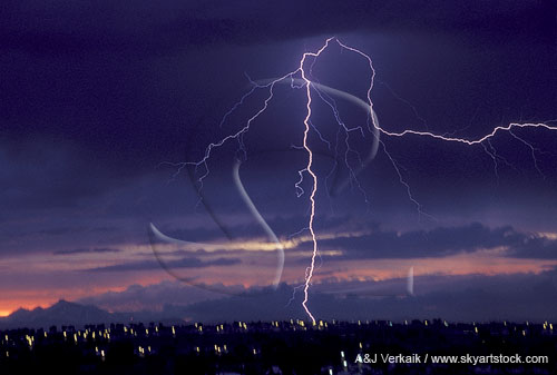 Cloud-to-ground lightning bolt at twilight