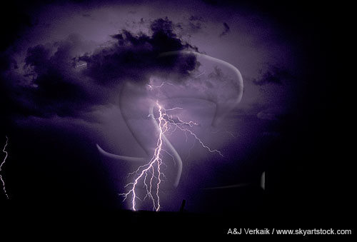 A single bolt lightning strike in a stormy sky