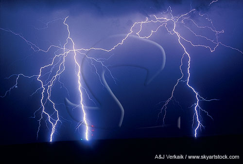 Four bolts, one very bright, demonstrate lightning behavior