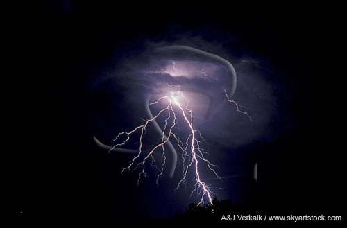 Lightning flashes from a hot spot in a stormy sky