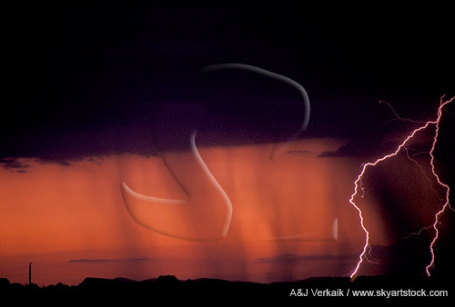 White lightning bolts stand out against a deep orange-red sunset sky