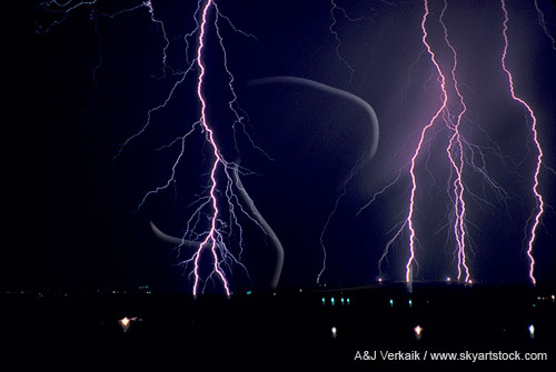 Close-up of streak lightning bolts darting down