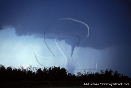 A tornado has just touched down and spins up a debris cloud
