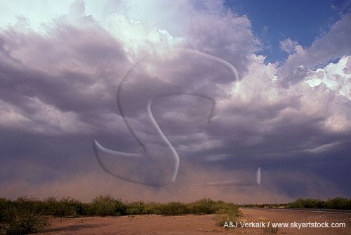 An approaching desert storm with strong winds and blowing dust
