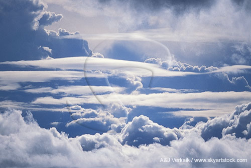 Ethereal layers of clouds create a heavenly scene above the clouds