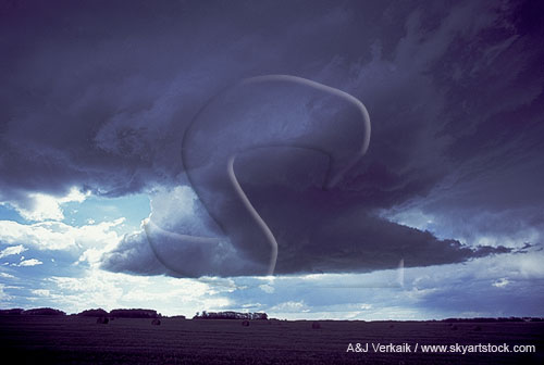 Very close view of a cloud shaped by rotation and abrupt wind shift
