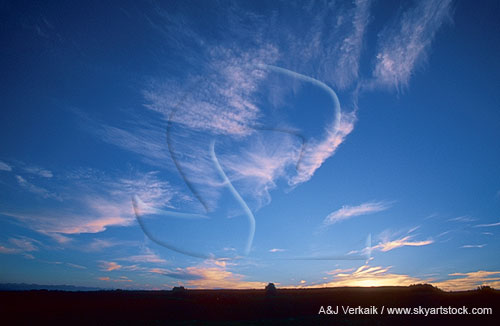 A flight of angelic cloud wisps in subtle twilight