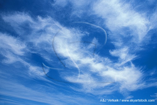 Abstract of joyful clouds dancing in the blue sky
