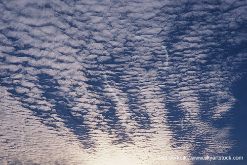 Unusual cloud patterns and lighting, with billows and cloudlets
