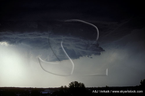 Close-up of a pedestal lowering on a storm’s wall cloud
