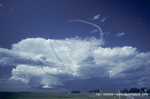 A supercell severe thunderstorm with a pedestal cloud lowering