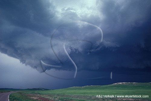 A funnel shows that a tornado is imminent in this classic supercell storm