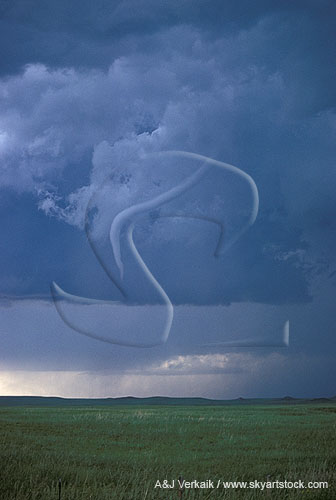 A tornadic funnel thins in the rope stage of a tornado life cycle 
