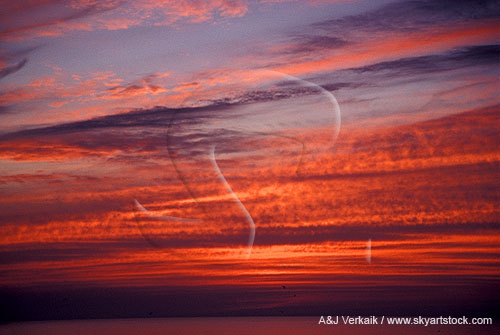 Clouds with delicate detail in a red sunset