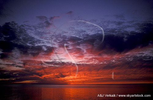 Meditative red sunset over still water
