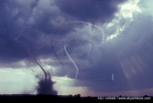 Skinny rope-like tornado, funnel bent by outflow