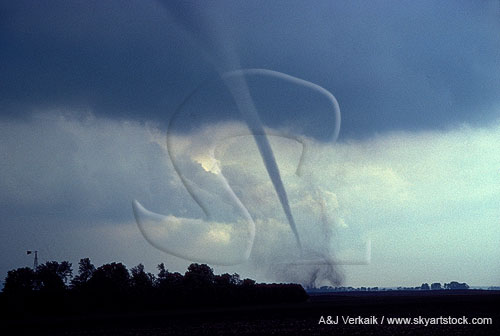 Tornado against a clearing sky