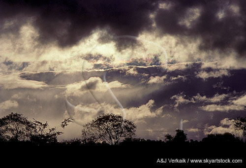 Mysterious clouds with silver lining and golden light