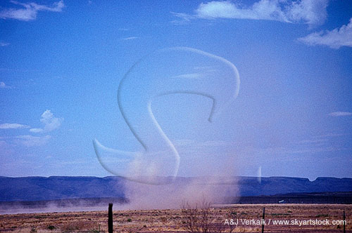 Close dust devil vortex with dust cloud at ground level