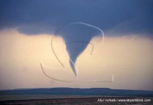 Descending funnel with tornado that has already touched down