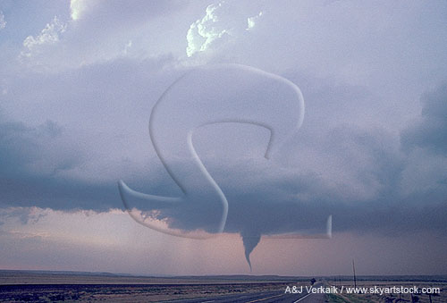 Wide view of tornado on circular lowered cloud base