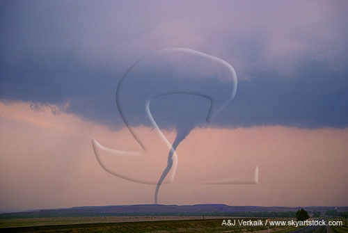 Snaky tornado in softly colored sunset sky