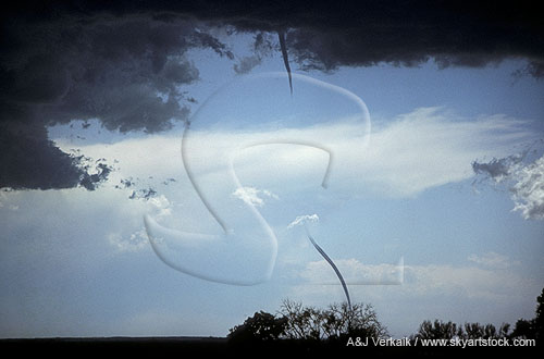 A segmented tornado with parts of the funnel invisible due to dry air